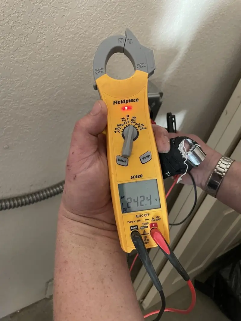 Voltage testing with clamp meter during Generator Installation in Morristown